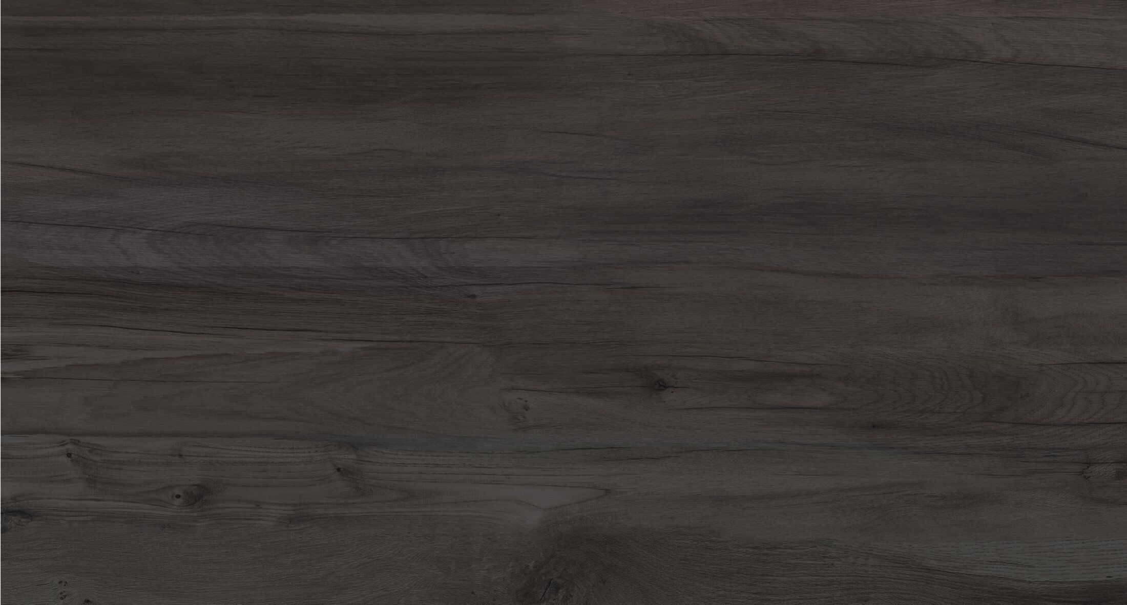 Dark wooden surface with subtle grain texture.
