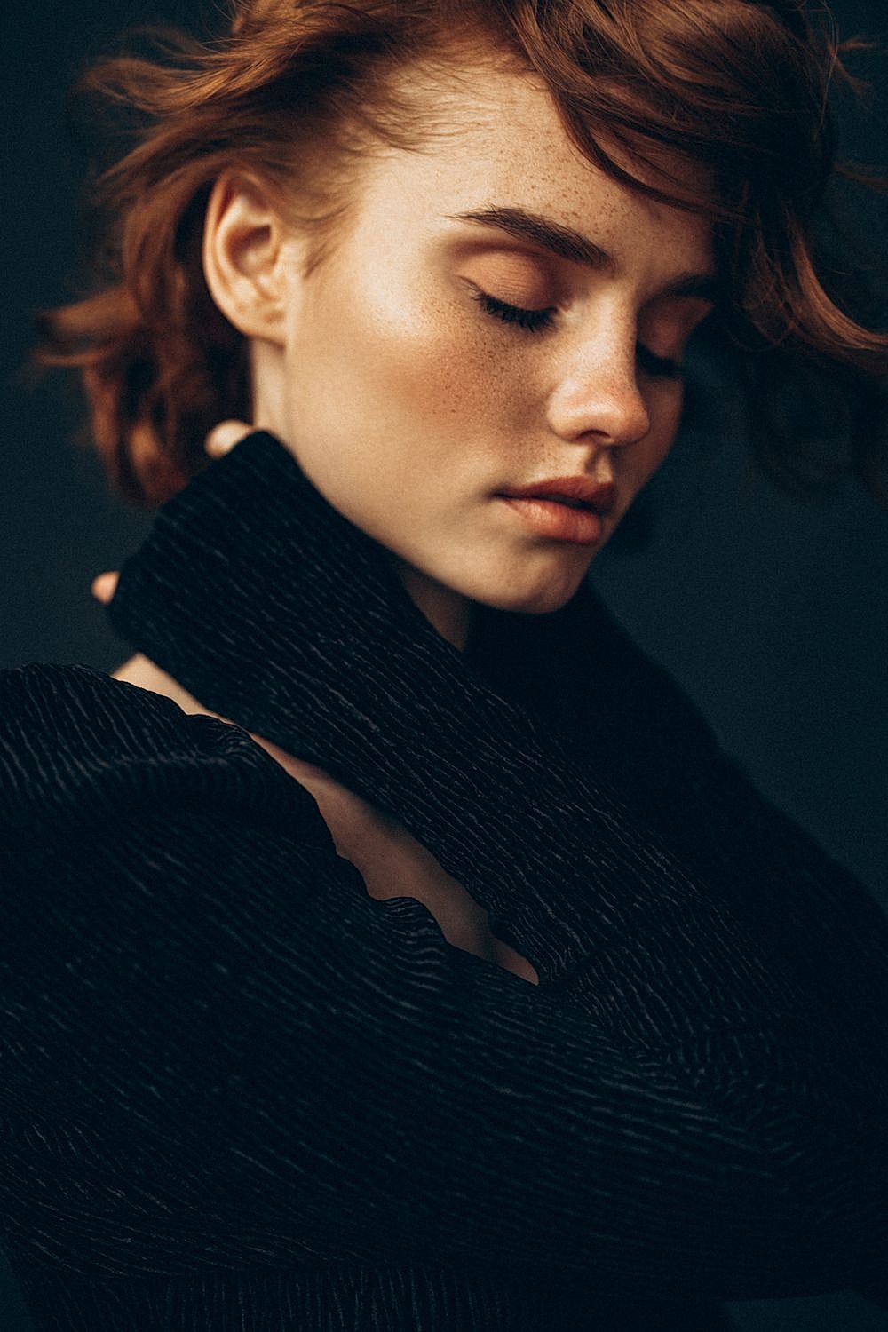 Portrait of a woman with closed eyes.