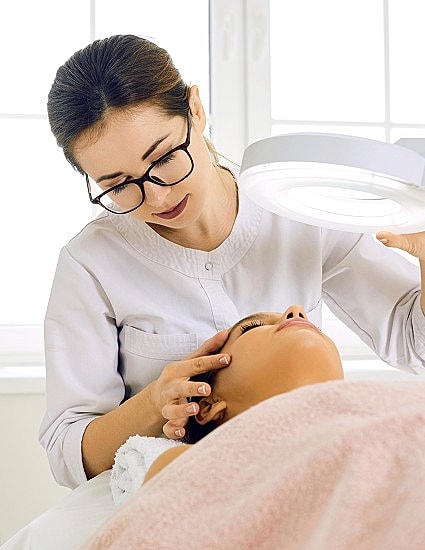 Skincare treatment in a beauty salon setting.